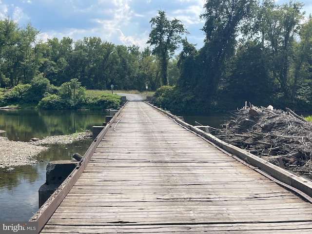 view of dock with a water view