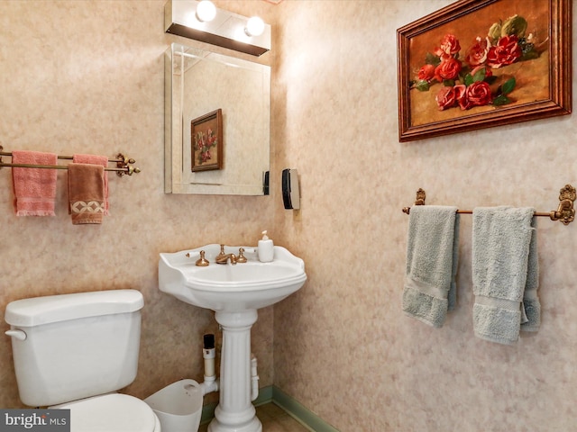 half bathroom with toilet