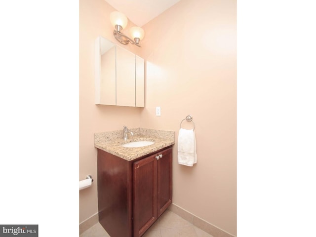 bathroom with vanity and tile patterned flooring