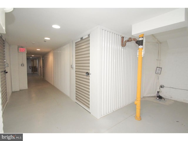 hallway featuring concrete floors