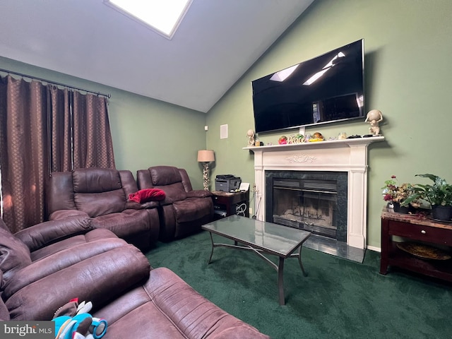 carpeted living room featuring vaulted ceiling and a premium fireplace