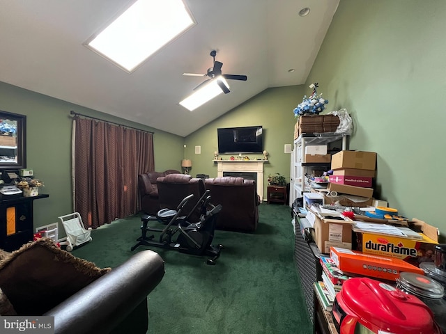 office space with dark colored carpet, vaulted ceiling, and ceiling fan