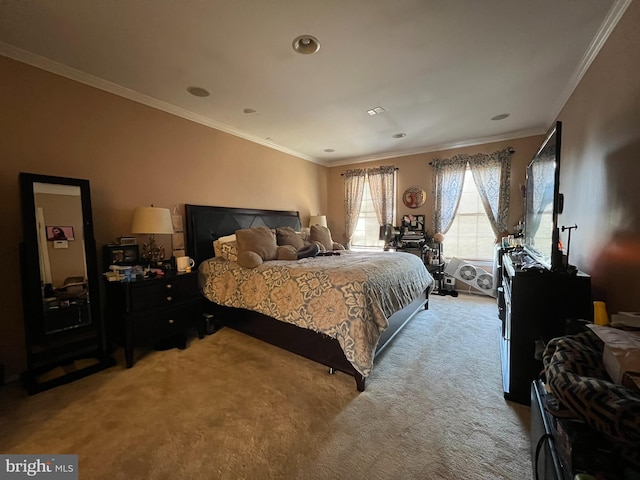 bedroom featuring ornamental molding and carpet flooring