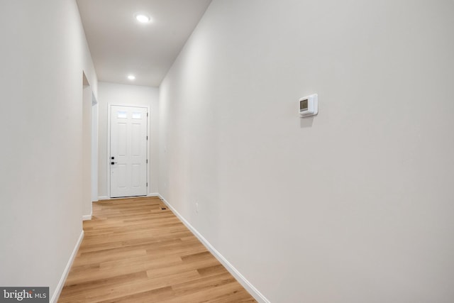 corridor featuring light hardwood / wood-style flooring