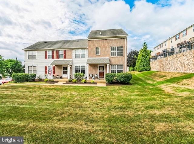 view of front of home featuring a front lawn