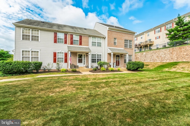 view of front of home with a front lawn