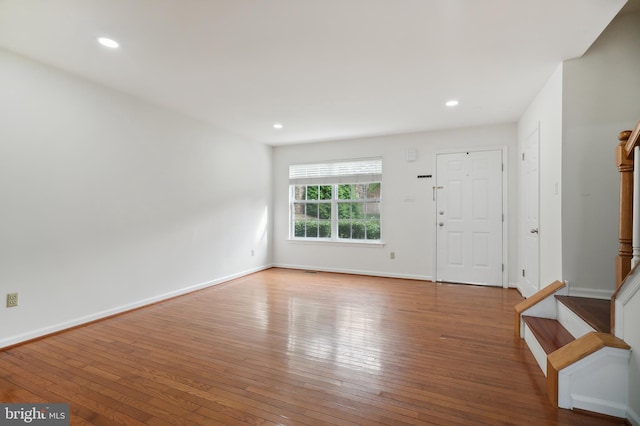 foyer with wood-type flooring