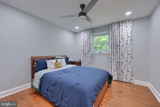 bedroom featuring ceiling fan and hardwood / wood-style floors