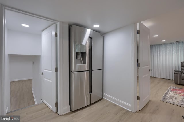 hall featuring light wood-type flooring