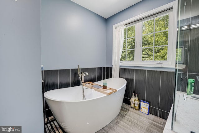 bathroom with a washtub