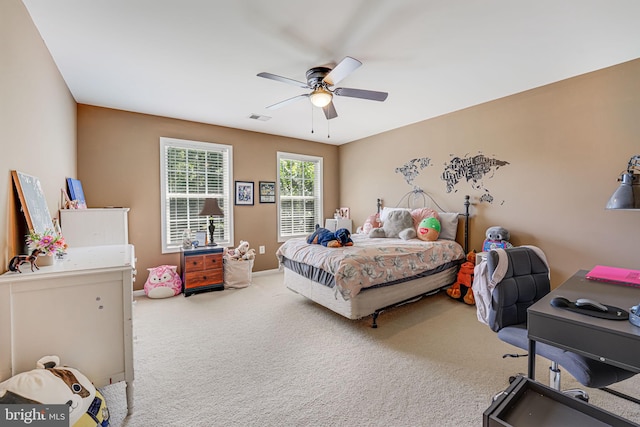 bedroom with ceiling fan and carpet