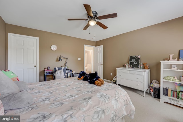 bedroom featuring light carpet and ceiling fan