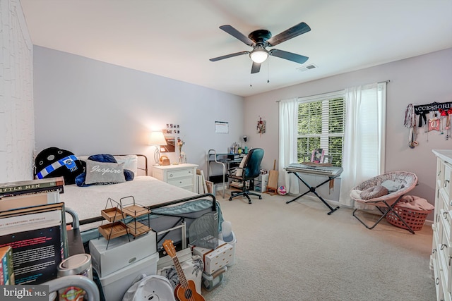 carpeted bedroom with ceiling fan