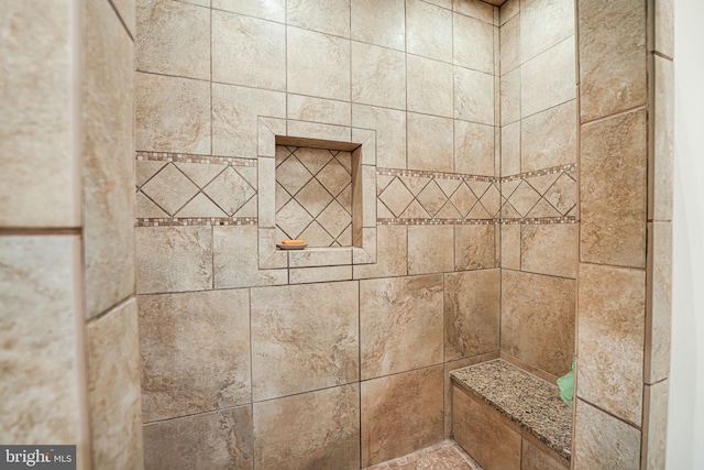 details featuring a tile shower