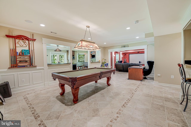 recreation room featuring billiards and ornamental molding