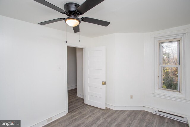 spare room with carpet floors and ceiling fan