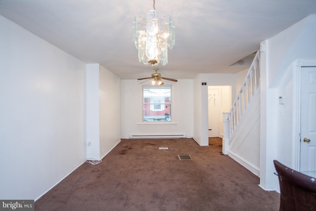 carpeted spare room featuring a baseboard radiator and ceiling fan with notable chandelier