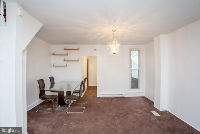 sitting room with a baseboard radiator, dark carpet, and a chandelier