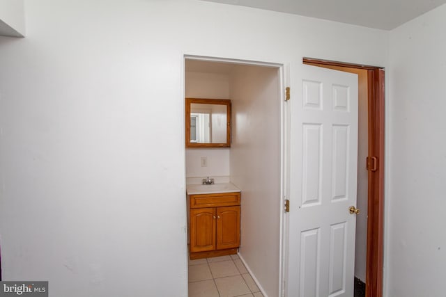 bathroom with vanity and tile patterned flooring