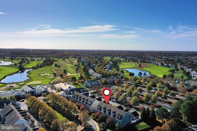 drone / aerial view featuring a water view and golf course view