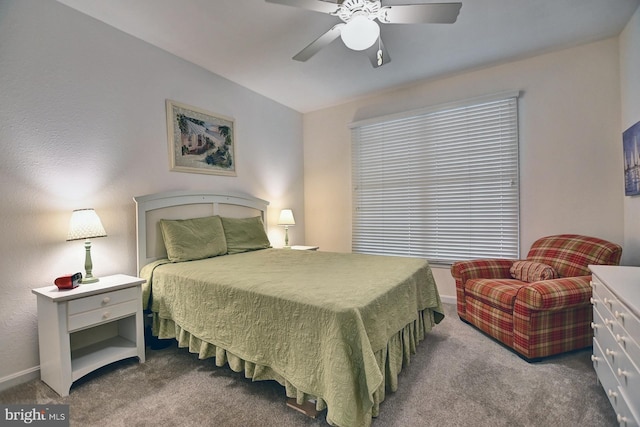 carpeted bedroom with baseboards and a ceiling fan