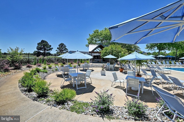 view of patio with fence