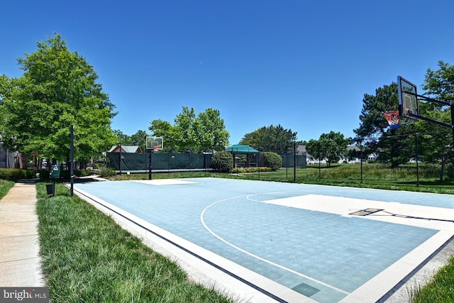 view of sport court with community basketball court and fence