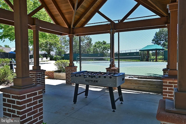 view of patio / terrace featuring fence and a gazebo