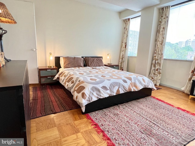 bedroom featuring wood finished floors