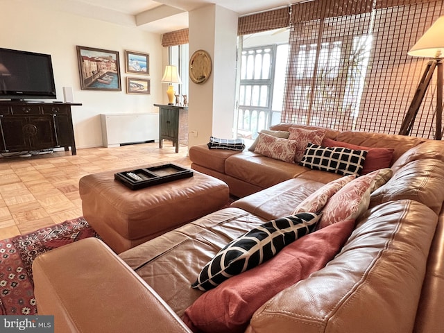 living room with light parquet floors