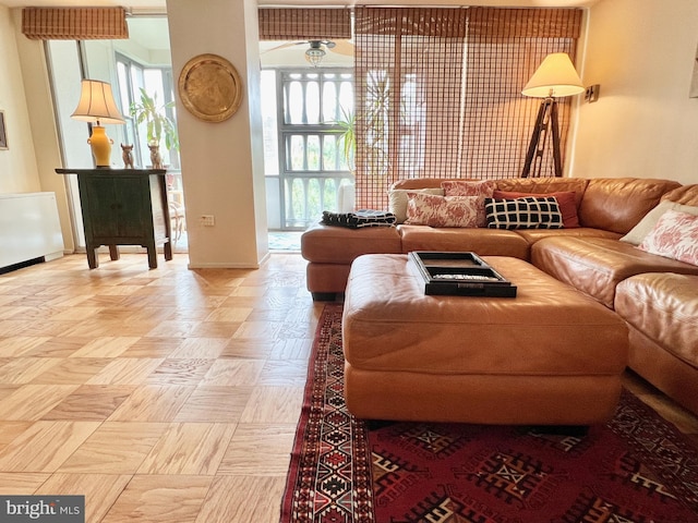 living room featuring a healthy amount of sunlight