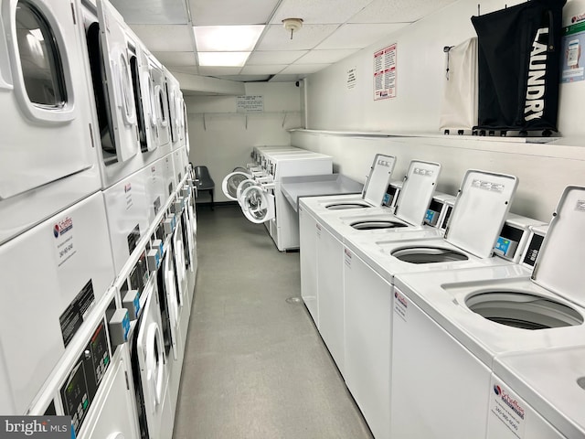 shared laundry area with separate washer and dryer and stacked washer and dryer