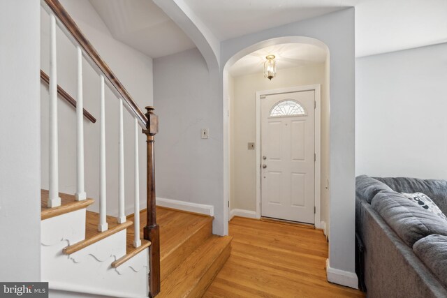 foyer with light hardwood / wood-style floors