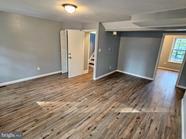 unfurnished bedroom featuring hardwood / wood-style floors