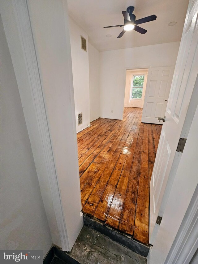 interior space featuring ceiling fan and hardwood / wood-style flooring