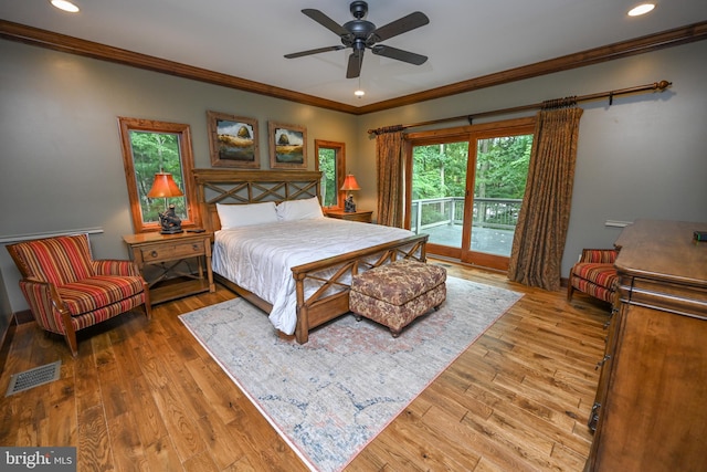 bedroom with crown molding, recessed lighting, visible vents, wood finished floors, and access to outside