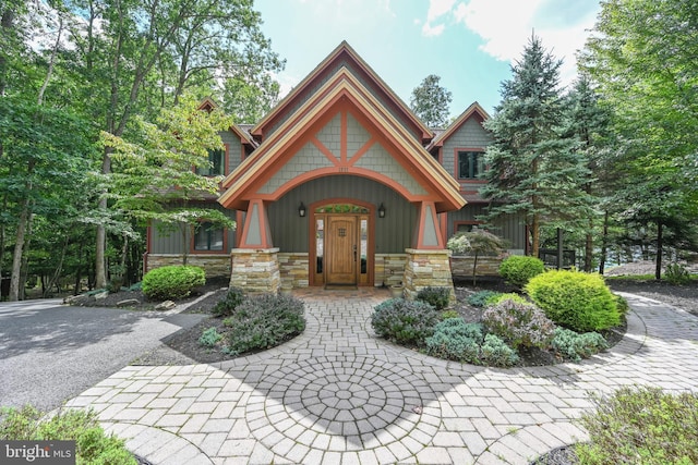 view of front of house featuring stone siding