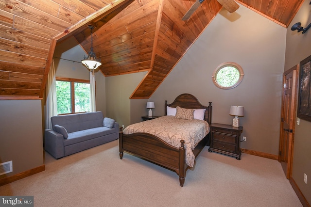 bedroom featuring a ceiling fan, wood ceiling, light carpet, and baseboards