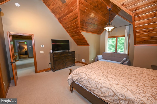 bedroom featuring lofted ceiling, baseboards, wood ceiling, and light colored carpet