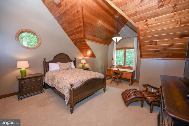 carpeted bedroom with lofted ceiling, wooden ceiling, and baseboards