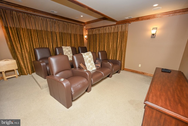 cinema with carpet floors, visible vents, beamed ceiling, and baseboards