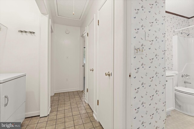 washroom featuring light tile patterned flooring