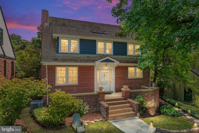 view of front of property featuring central AC unit