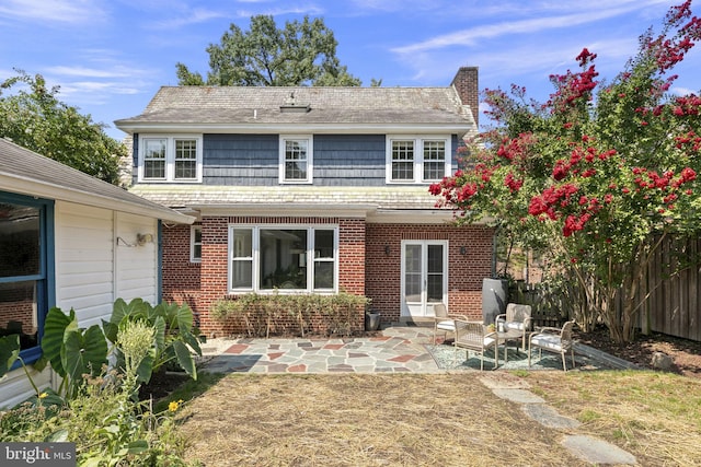 view of front of home with a patio area