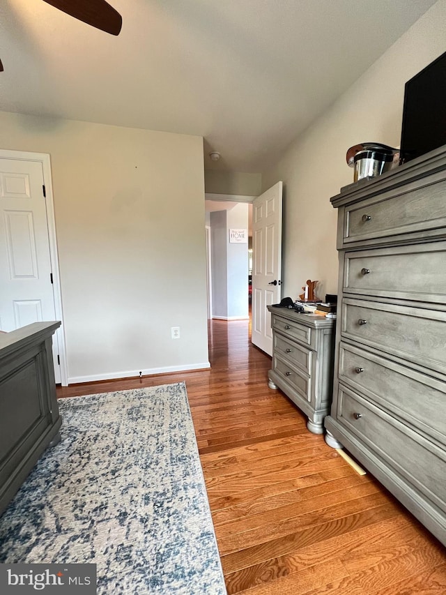 bedroom featuring ceiling fan and light wood-type flooring