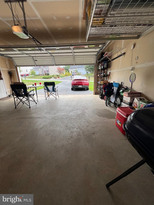 garage featuring a garage door opener