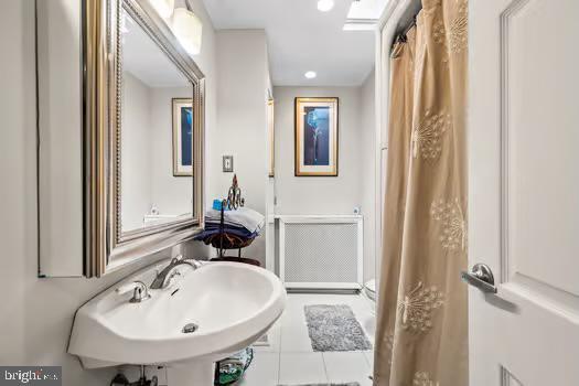 bathroom with sink and tile patterned floors