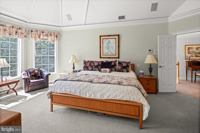 carpeted bedroom featuring vaulted ceiling and ornamental molding