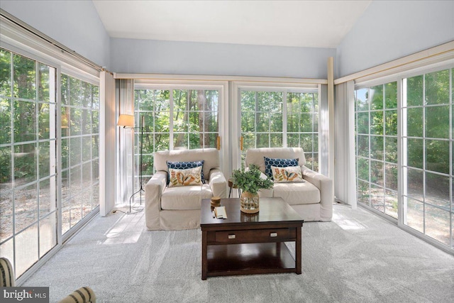 sunroom / solarium with a wealth of natural light and vaulted ceiling