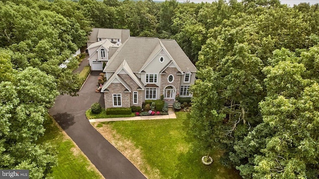 drone / aerial view with a lawn